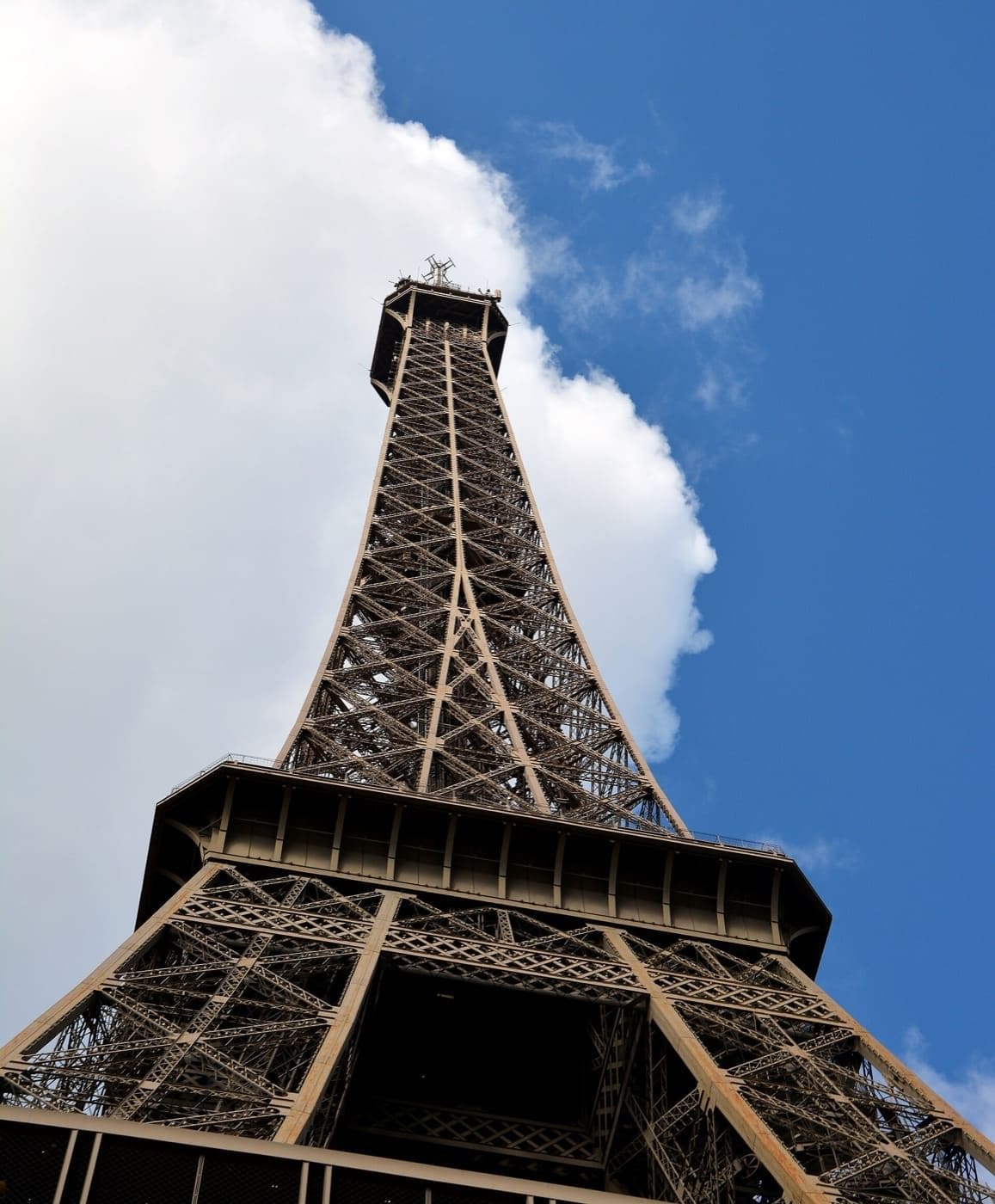 Eiffel Tower rising above Paris under a clear sky