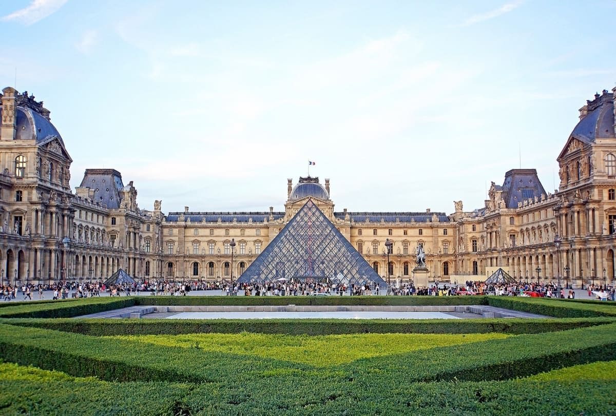 Glass Louvre Pyramid in the museum courtyard in central Paris